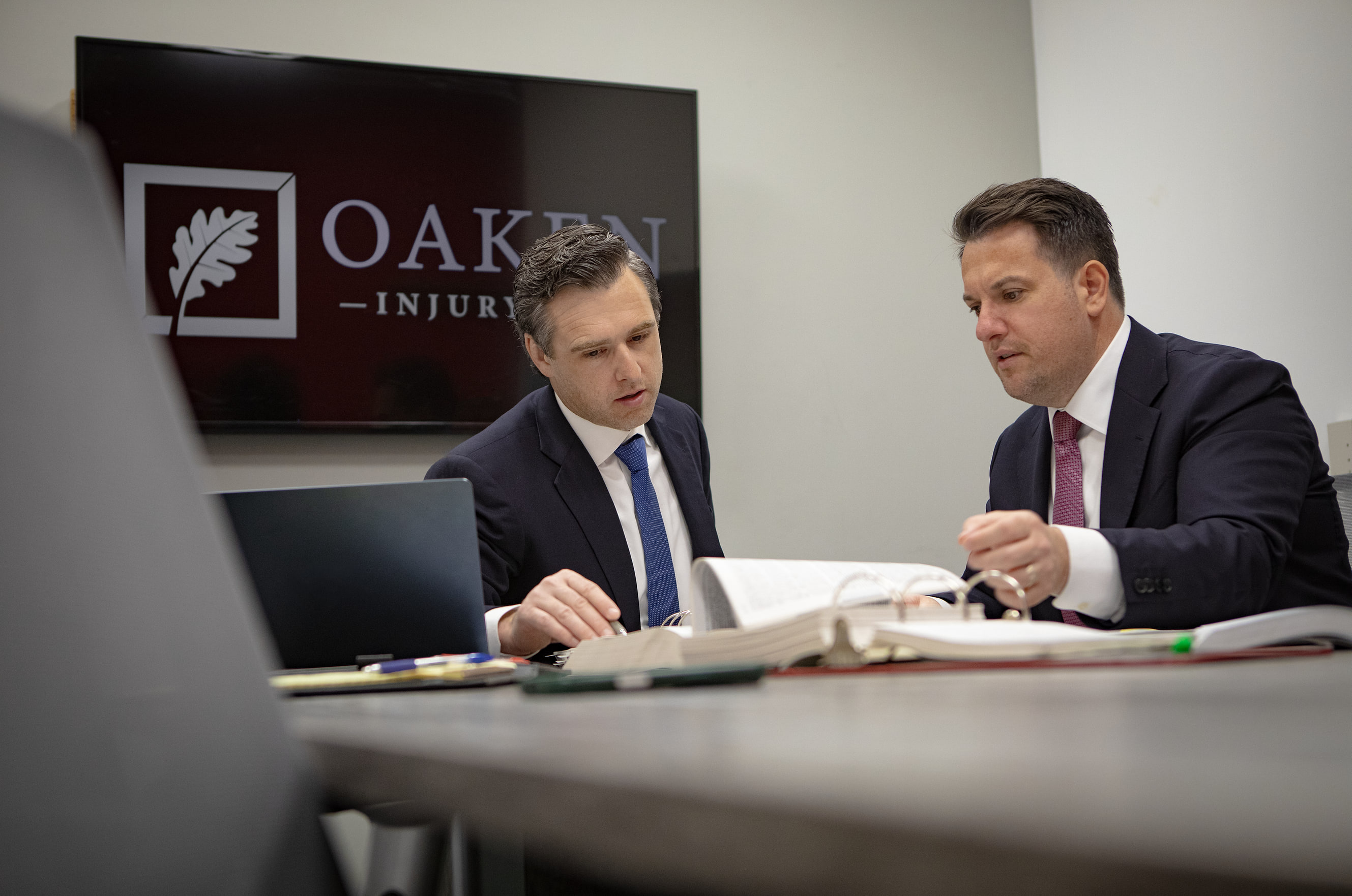 Oaken Injury Law attorneys collaborating